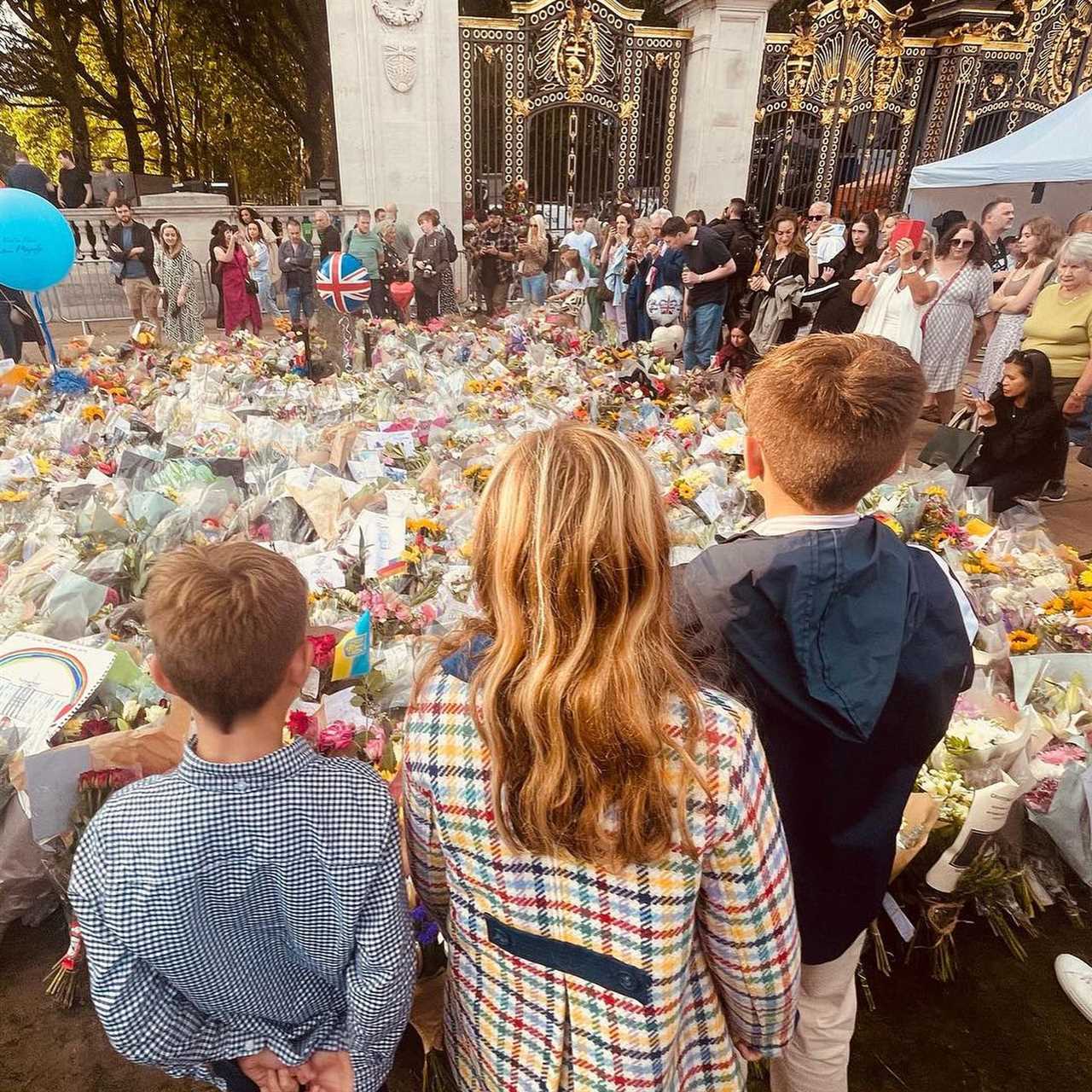 Holly Willoughby and her rarely-seen children pay emotional visit to Buckingham Palace to pay respects to the Queen