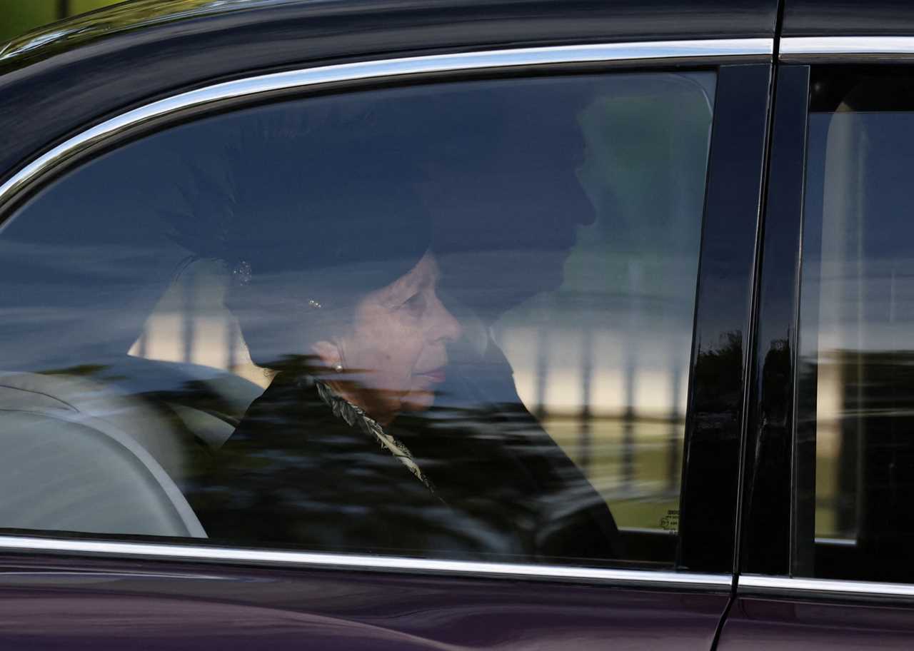 Emotional Princess Anne looks sombre as she and her husband Admiral Sir Tim Laurence accompany the Queen’s coffin