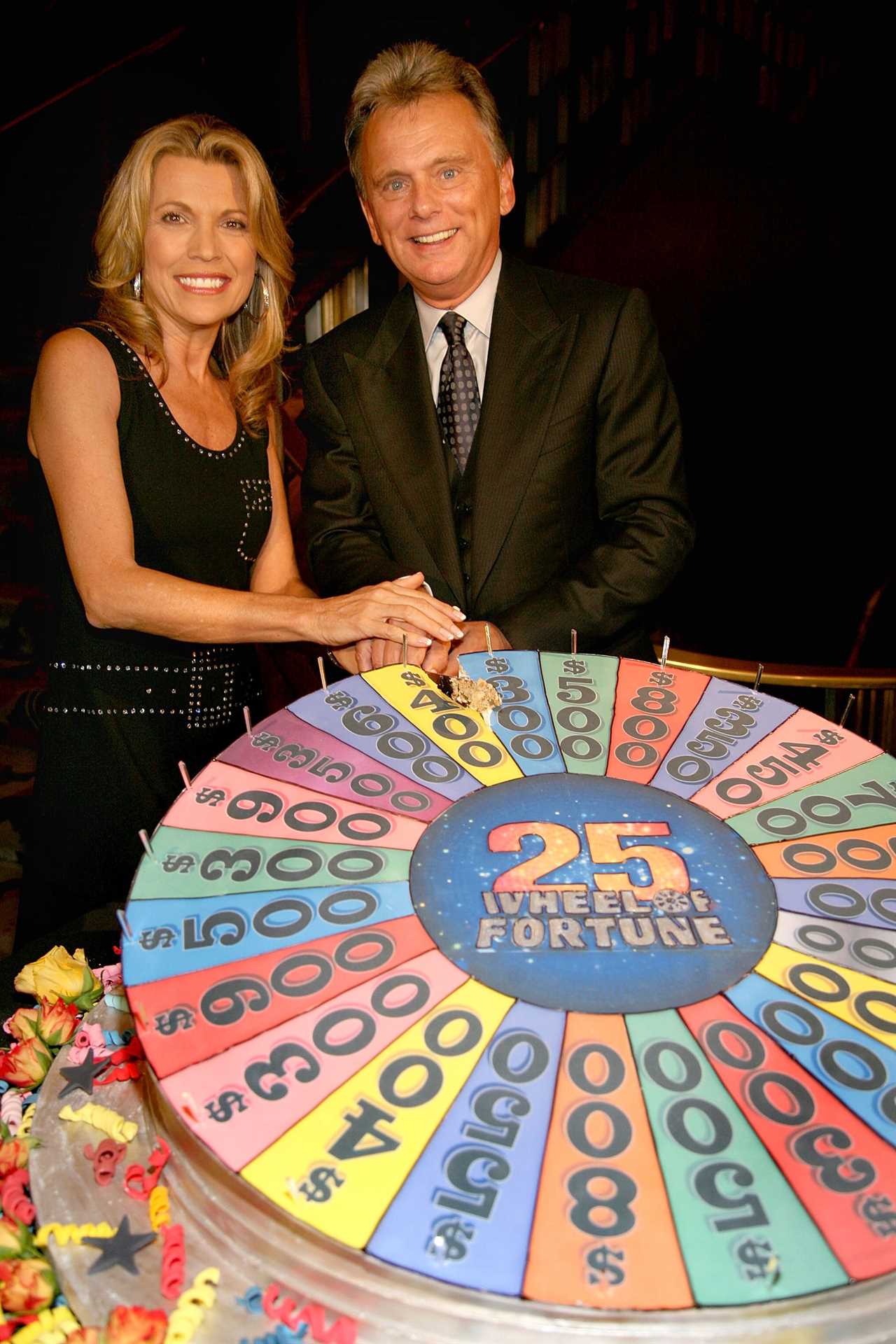 Who are the hosts of Wheel of Fortune?