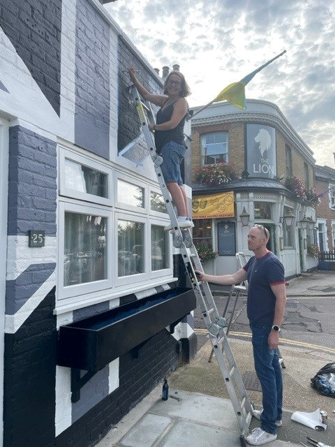 We painted our house with Union Jack for the Jubilee and now we’ve painted it black for the Queen – and we’ll keep it