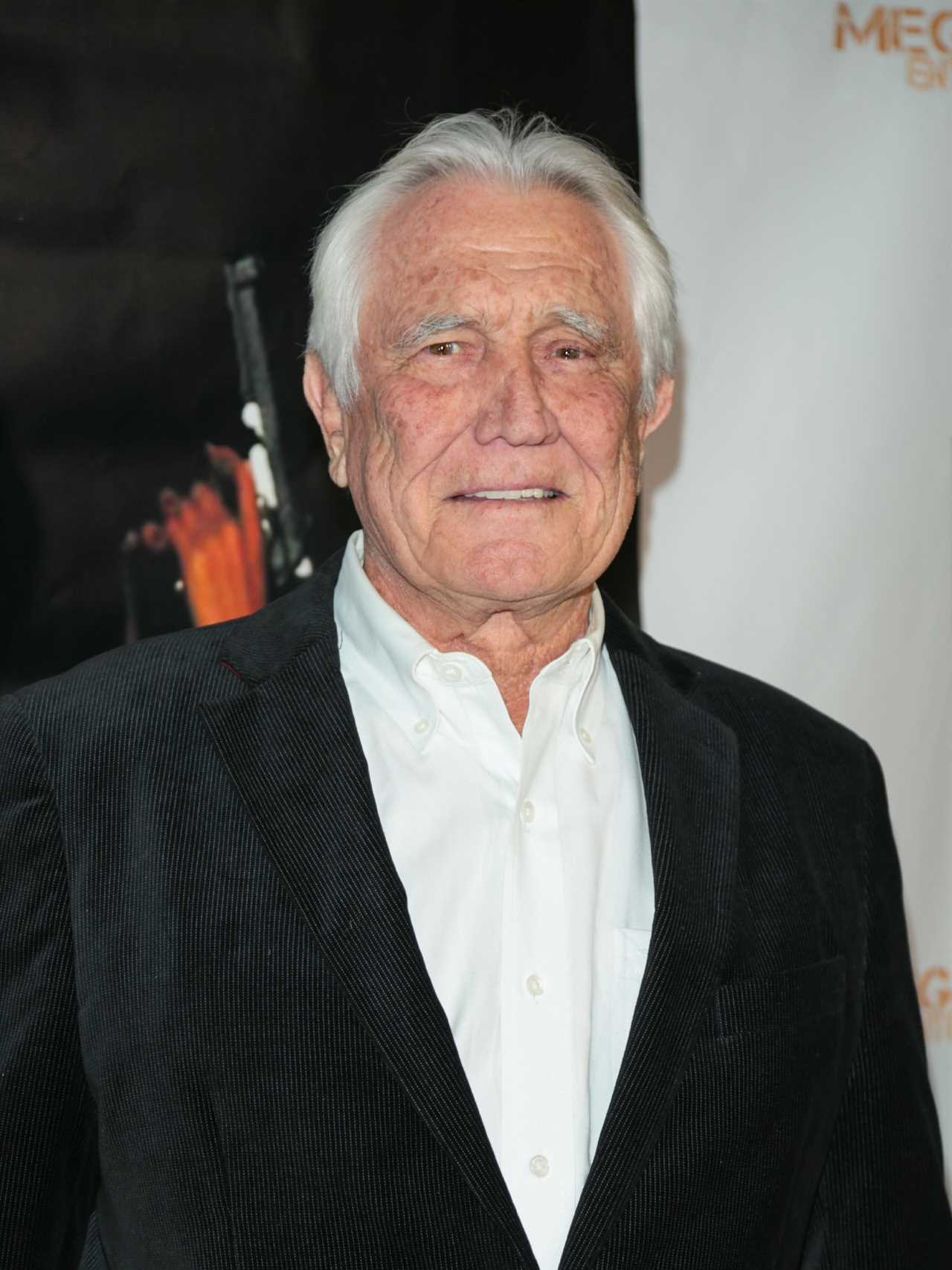 James Bond icon George Lazenby ‘booed off stage’ after ‘belittling the Queen’ and making ‘creepy sexist’ comments