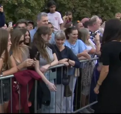 Watch awkward moment Meghan Markle is snubbed by royal fan who refuses to shake her hand at Fab Four’s walkabout