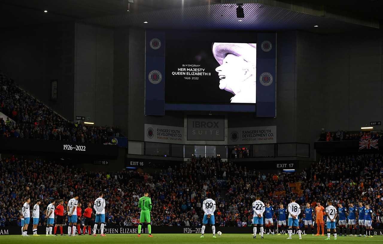 Watch Rangers players join entire Ibrox crowd to sing National Anthem after emotional minute’s silence for The Queen