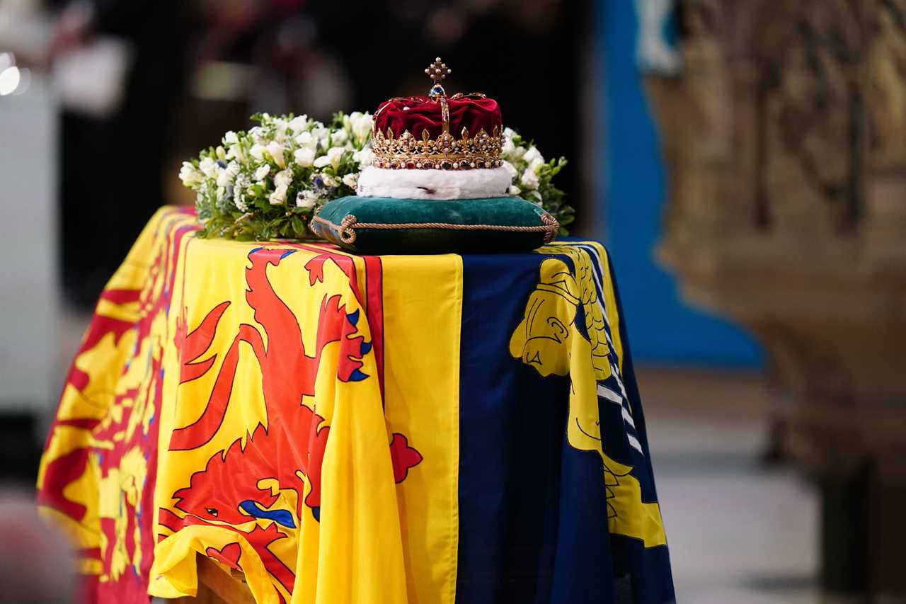 What is the Royal Standard flag and why is it draped over the Queen’s coffin?