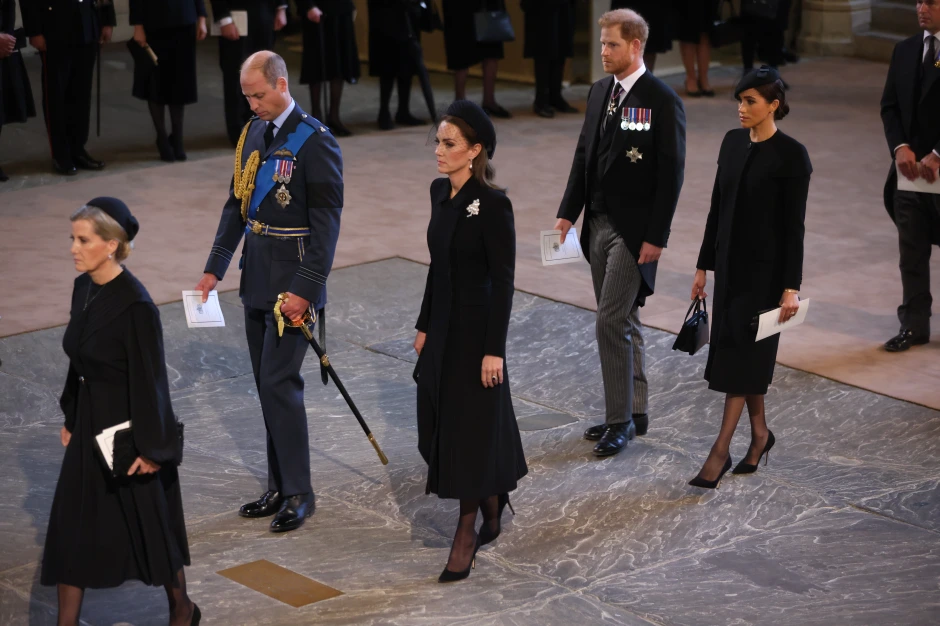 I’m a body language expert – here’s a breakdown on the ‘icy’ moment Kate glares at Meghan Markle as they’re reunited