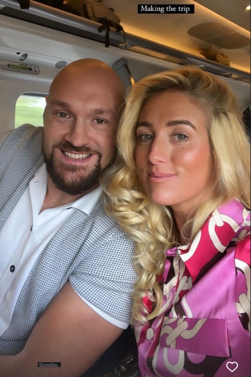 Tyson Fury and wife Paris in sweet tribute to The Queen as they lay flowers at the gates of Buckingham Palace