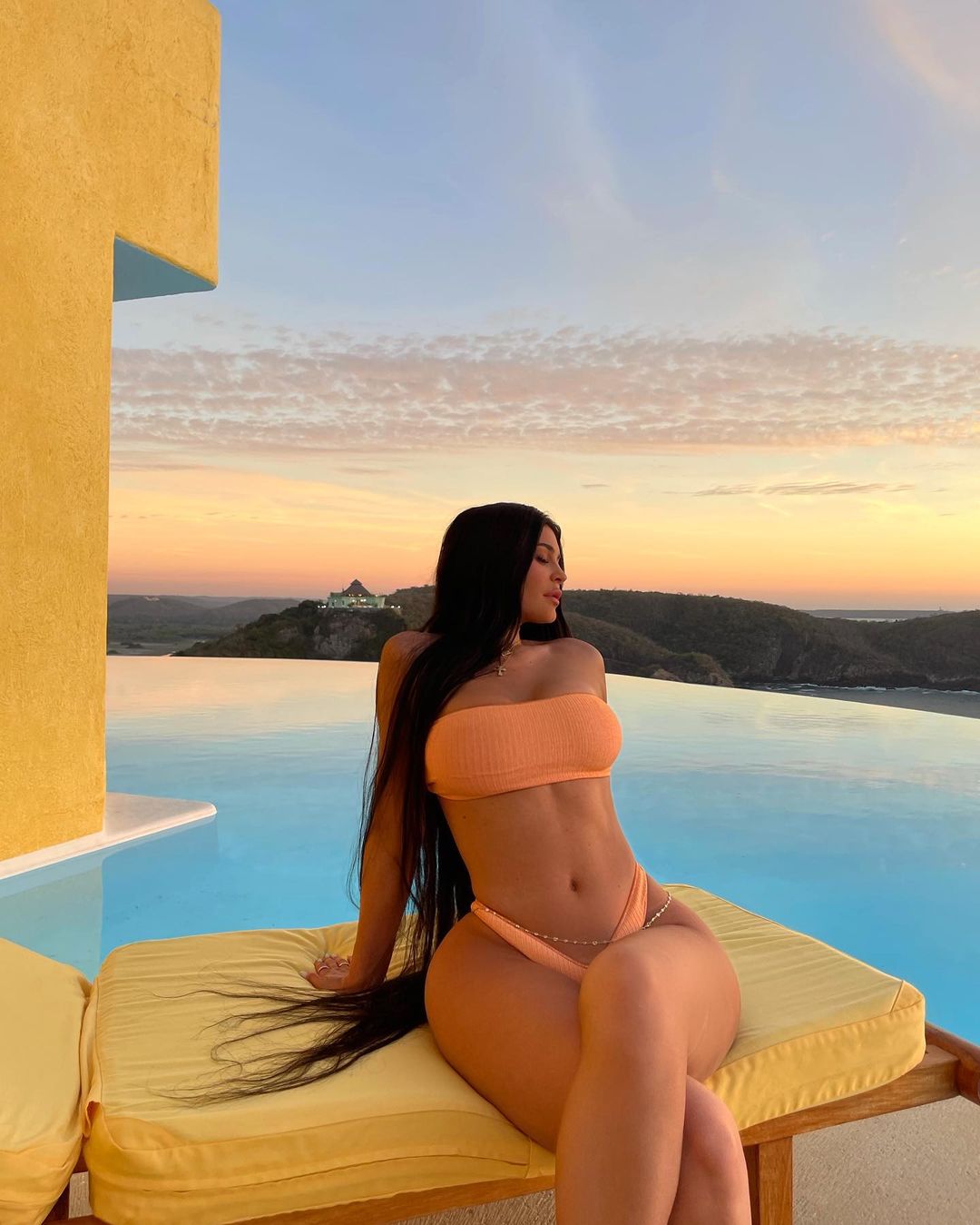 Kylie Jenner poses topless & shows off her post-baby body just months after welcoming newborn son