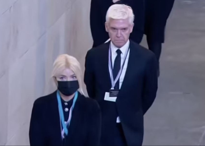 Holly Willoughby & Phillip Schofield face calls to be SACKED after backlash from fans for skipping Queen’s coffin queue