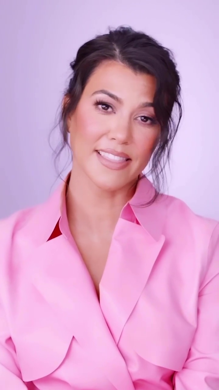 Kourtney Kardashian shows off slim body in green jumpsuit as fans slam star for photoshop fail in ‘heavily edited’ photo