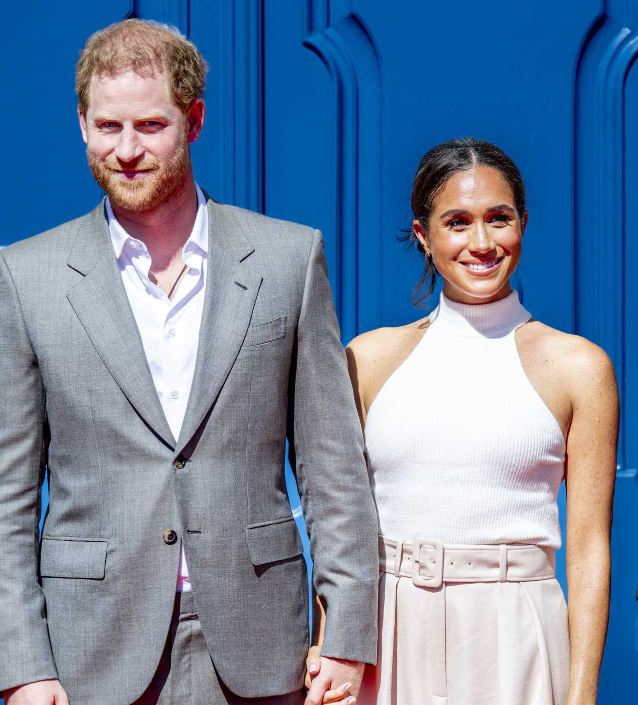 Prince Harry and Meghan Markle’s pal says it is ‘beyond bonkers’ that couple have been ‘uninvited’ from Palace reception