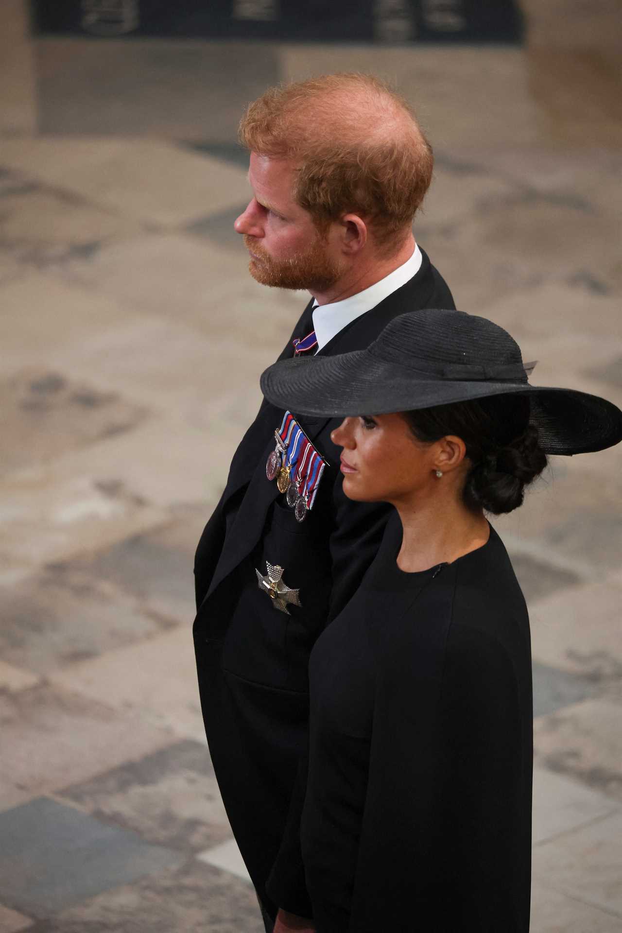 Meghan Markle consoled ‘distressed’ Harry at Queen’s funeral & was ‘tuned in’ to his needs, claims body language pro