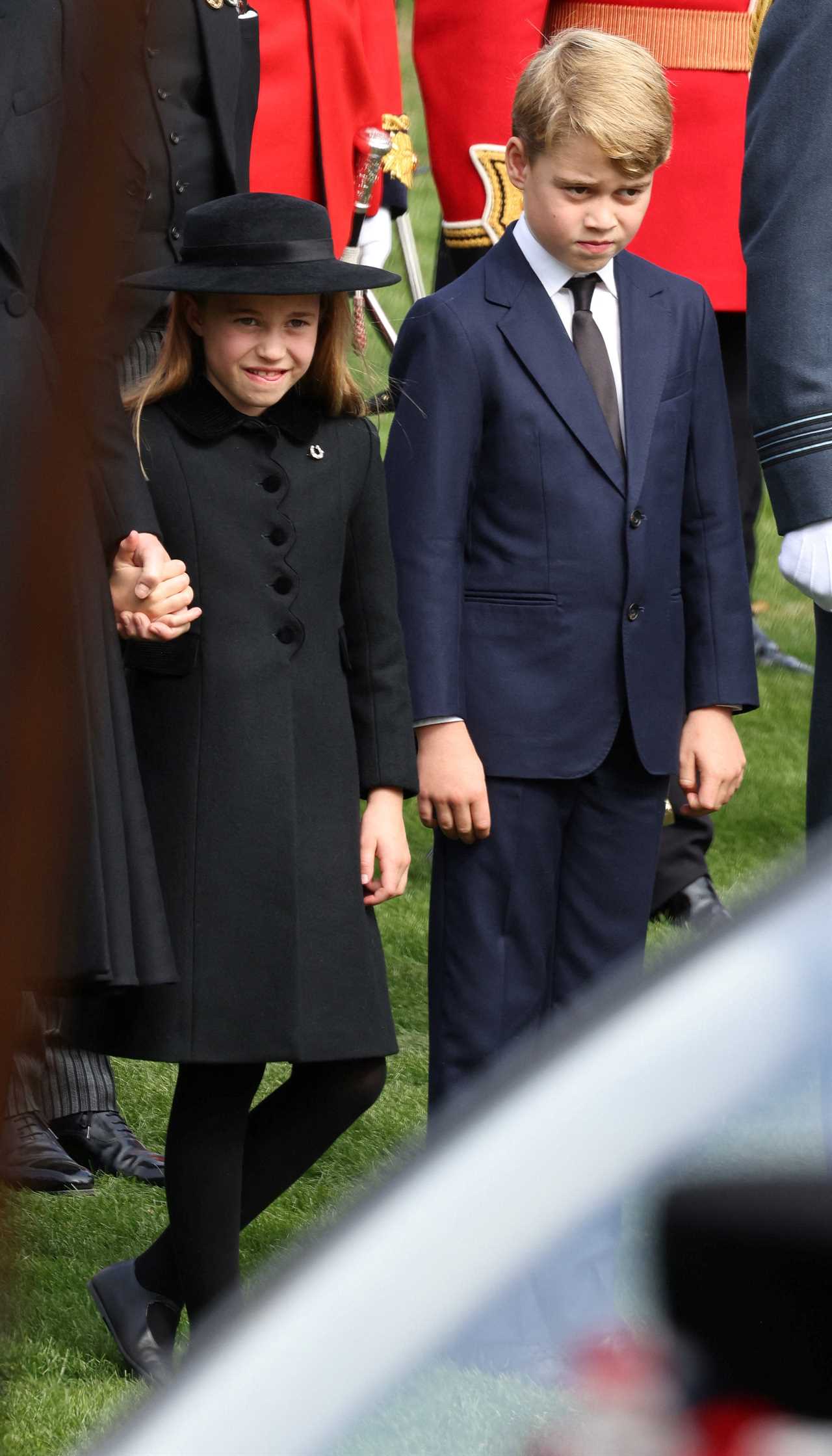 Royal fans spot the cute moment Charlotte appears to remind Prince George about official protocol at the Queen’s funeral