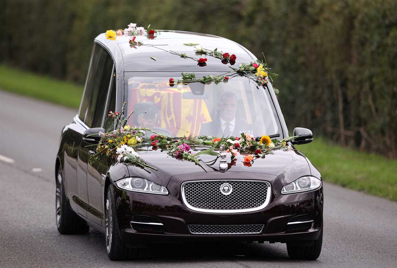 Moving moment a vast and silent crowd welcomed the Queen home for final time