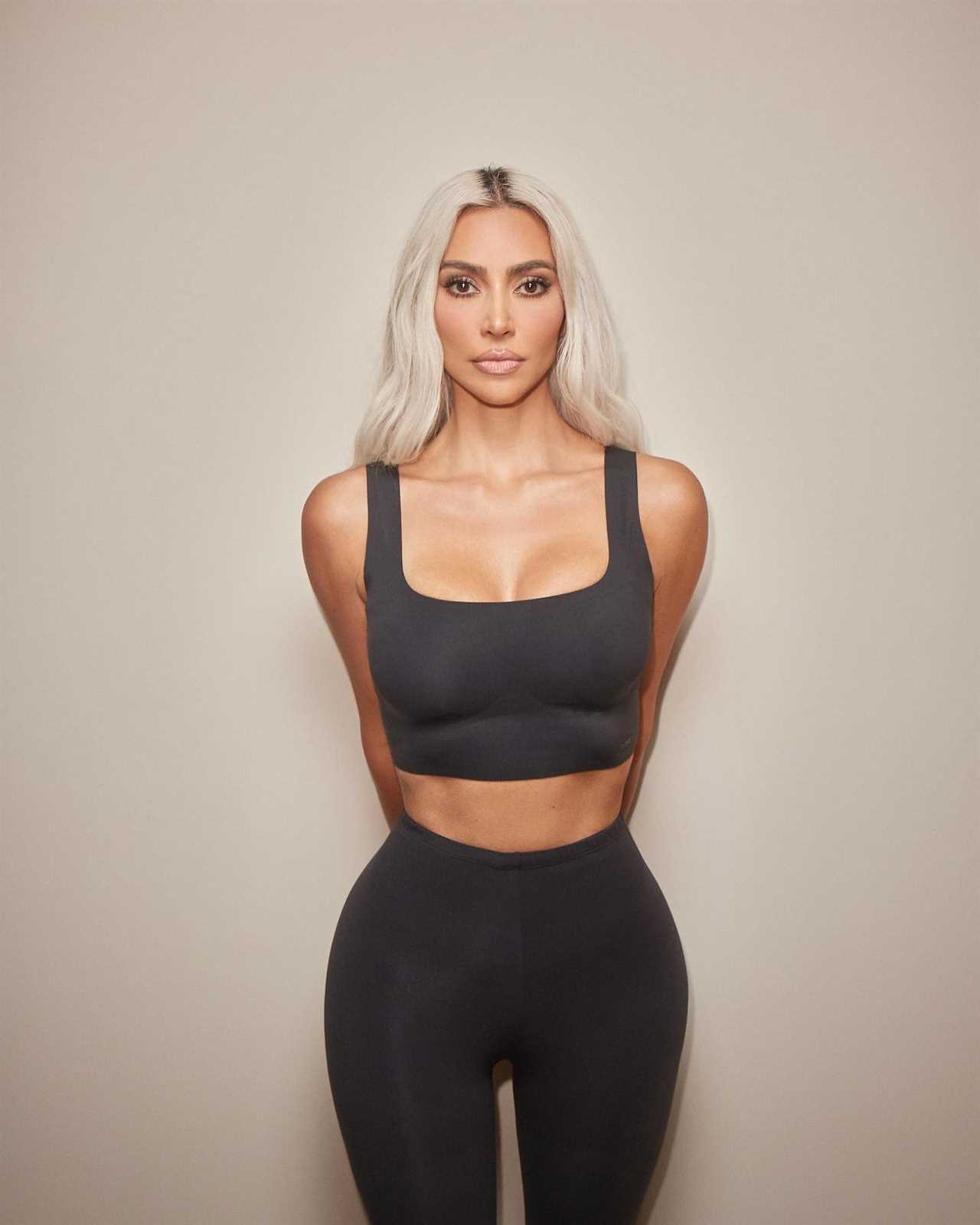 Kim Kardashian shows off her bare butt in leather thong bodysuit and thigh-high boots for racy Stuart Weitzman campaign