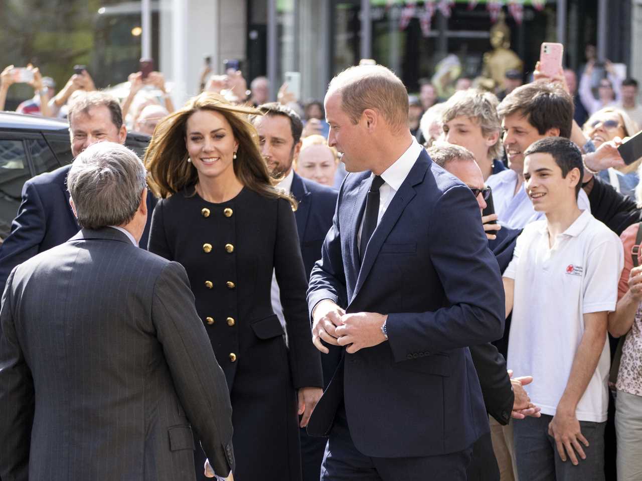 Princess Kate and Prince William beam as they meet volunteers who worked at Queen’s funeral