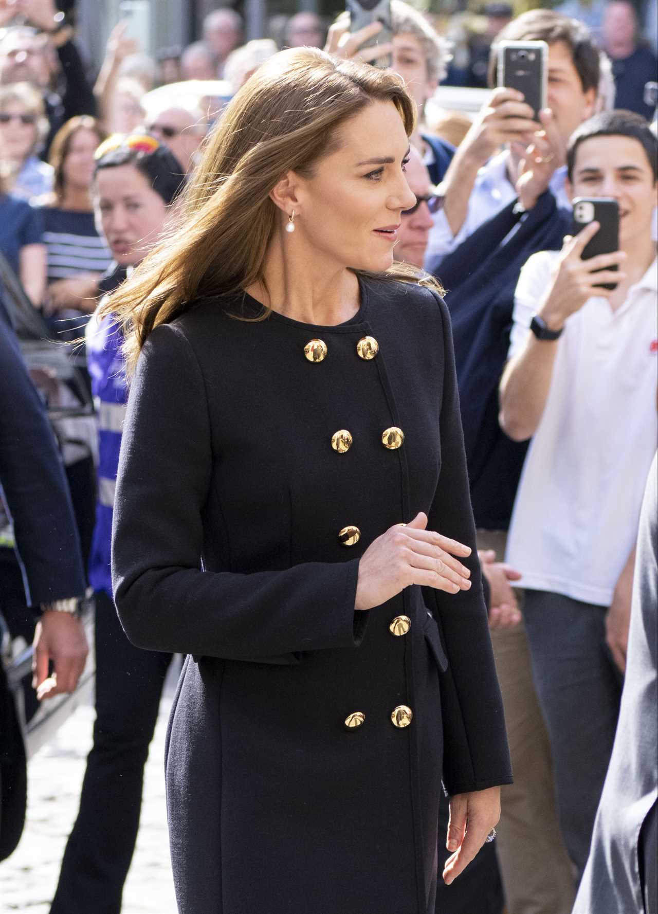 Princess Kate and Prince William beam as they meet volunteers who worked at Queen’s funeral