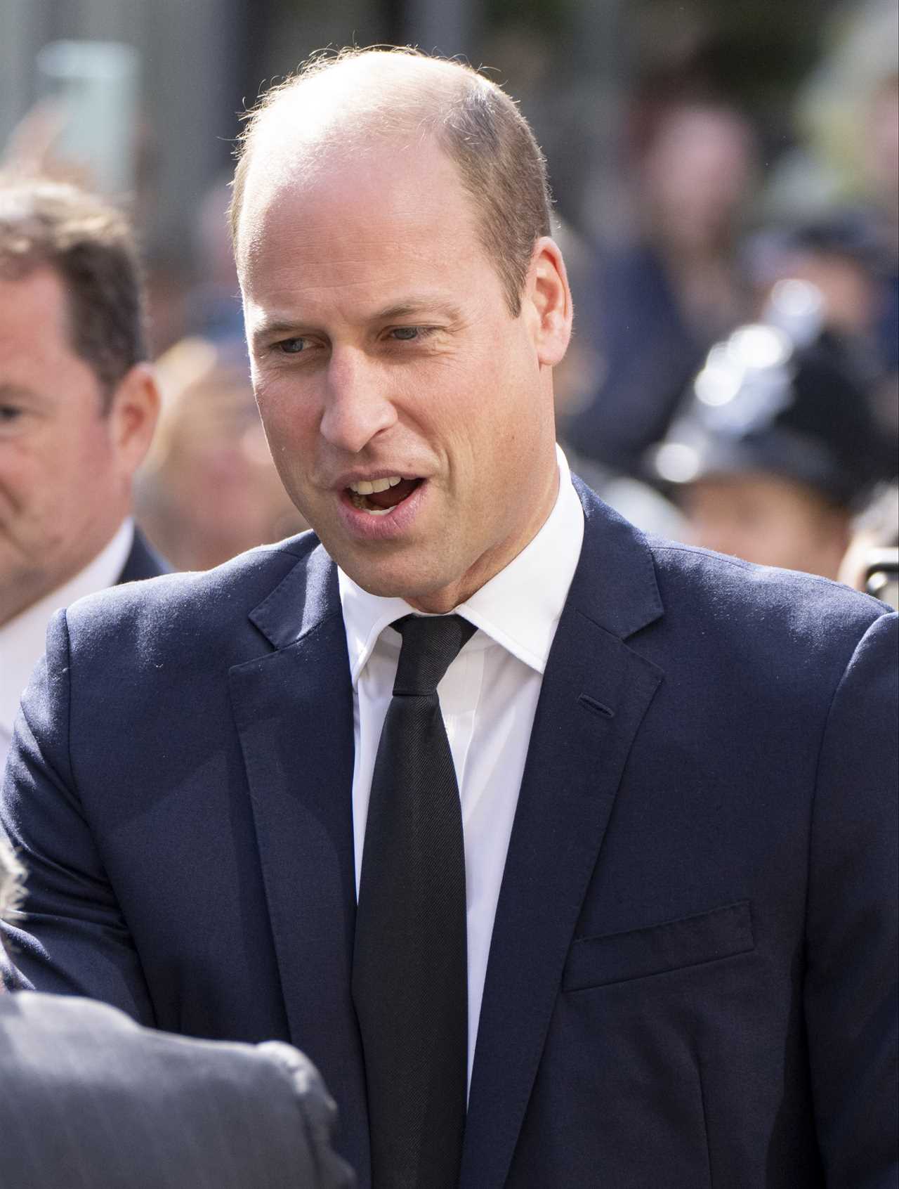 Princess Kate and Prince William beam as they meet volunteers who worked at Queen’s funeral