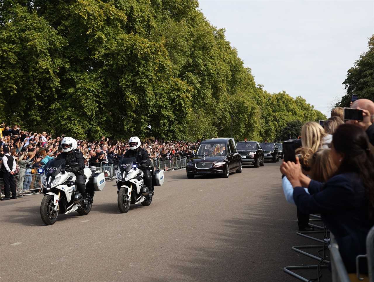 Royal fans complain about ‘disrespectful and inappropriate’ behaviour as the queen’s coffin passes by crowds of mourners