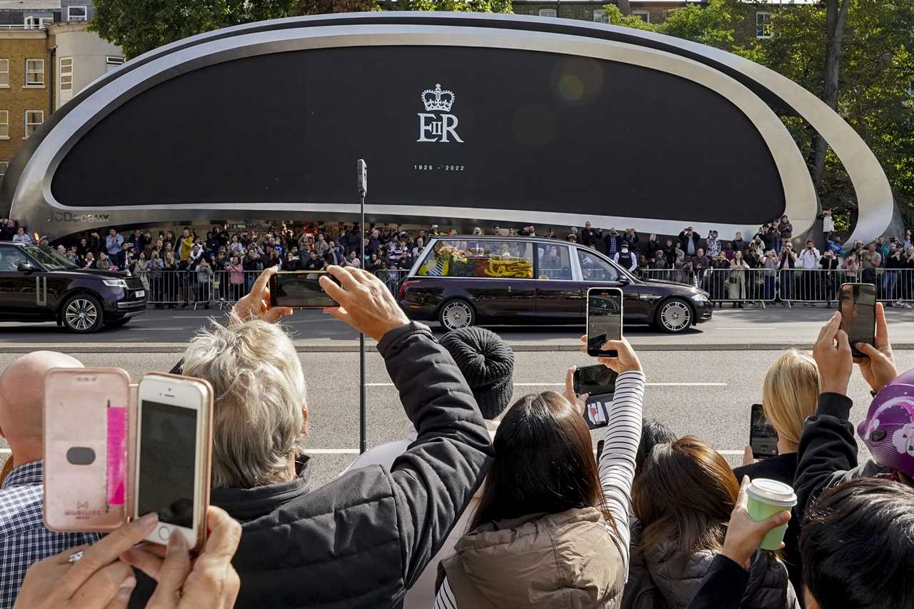 Royal fans complain about ‘disrespectful and inappropriate’ behaviour as the queen’s coffin passes by crowds of mourners