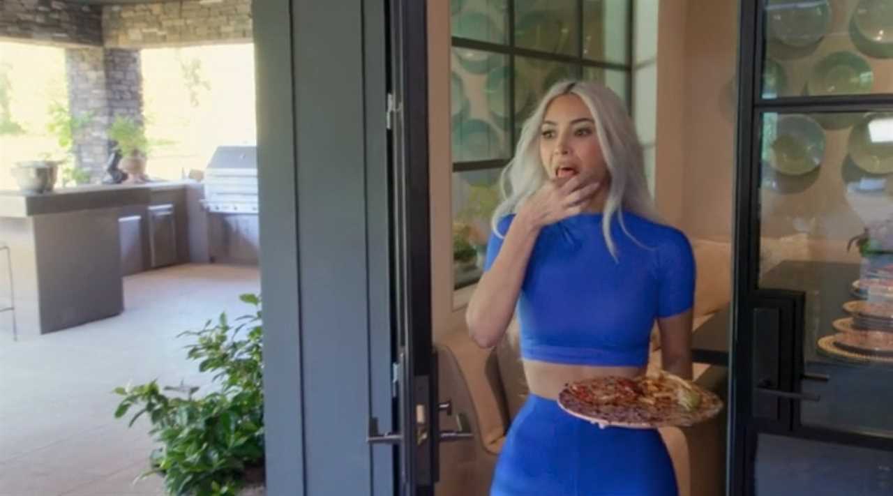 Kim Kardashian shows off her real stomach & curves in a skintight blue two-piece set in unedited clip from Hulu premiere