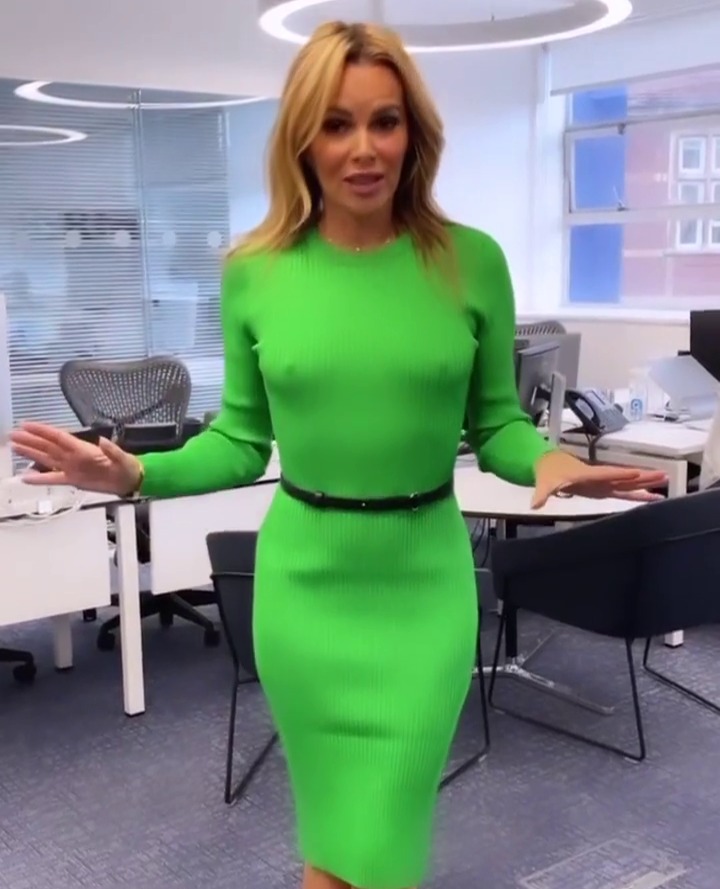 Amanda Holden goes braless in skintight green dress as she struts through Heart Radio office