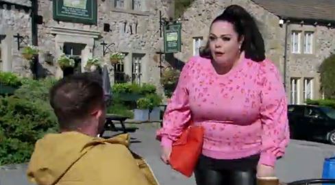 Emmerdale fans left hot under the collar as Mandy Dingle flaunts curves in skintight leather