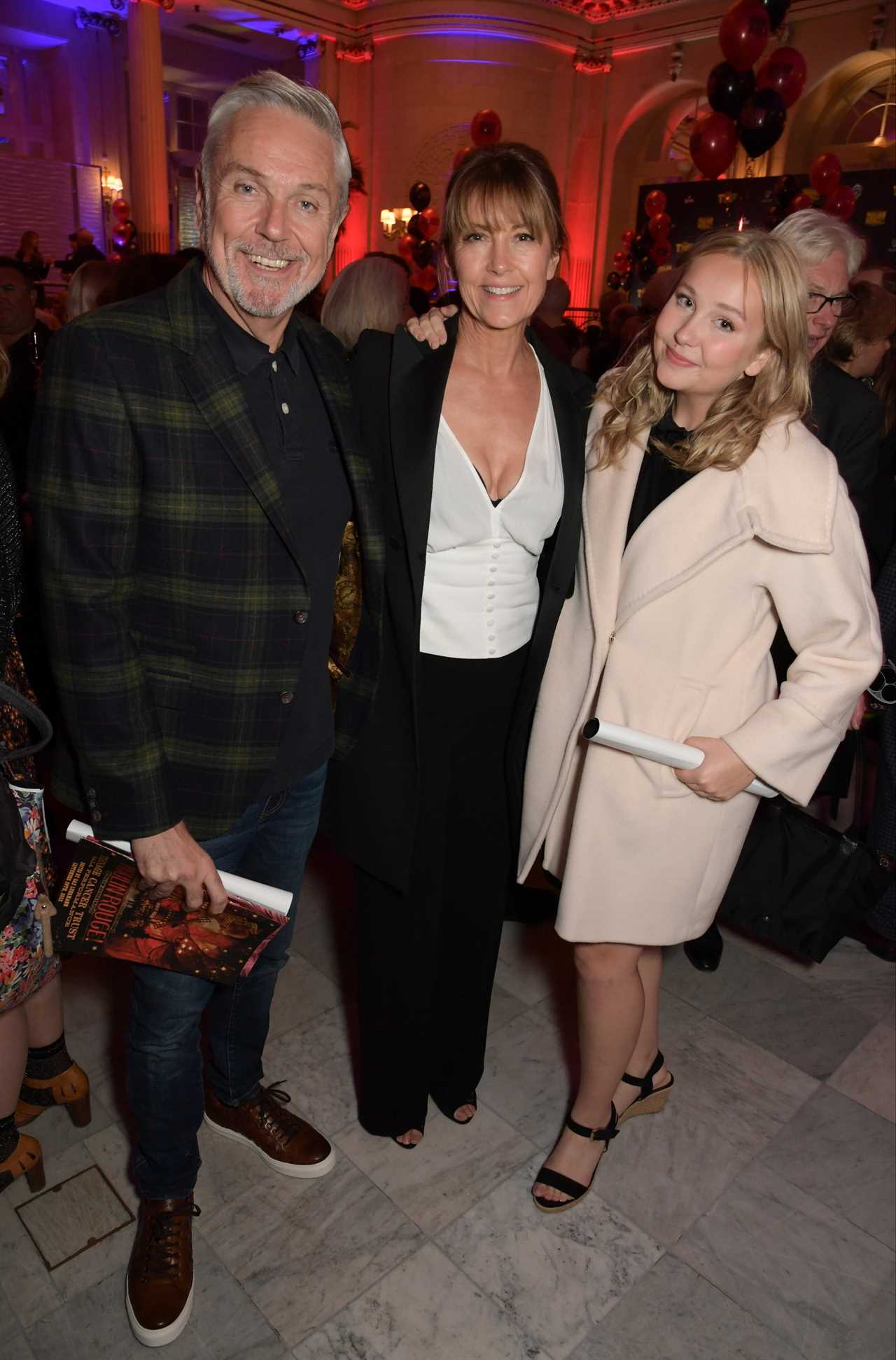 EastEnders star Brian Conley poses with rarely seen wife and daughter on night out in London