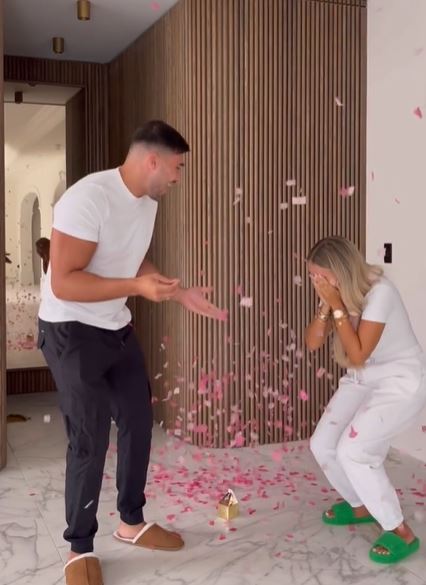Pregnant Molly-Mae Hague and Tommy Fury reveal their baby’s gender as boxer pops giant balloon