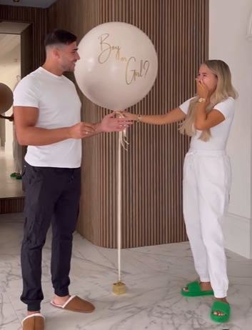 Pregnant Molly-Mae Hague and Tommy Fury reveal their baby’s gender as boxer pops giant balloon