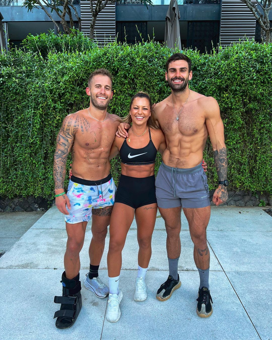 Love Island’s Adam Collard wraps his arms around two women in sports bras in Bali after Paige Thorne cheating claims