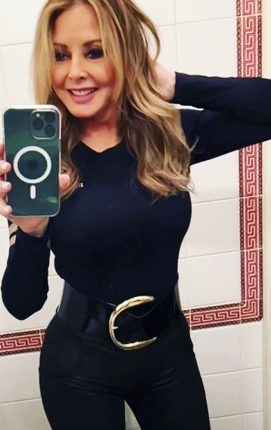 Carol Vorderman reveals tiny waist in skintight trousers and top as she teases new project