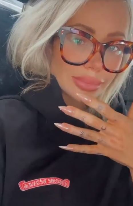 Love Island star Olivia Attwood shows off tattoos on her HANDS as she gets inked all over