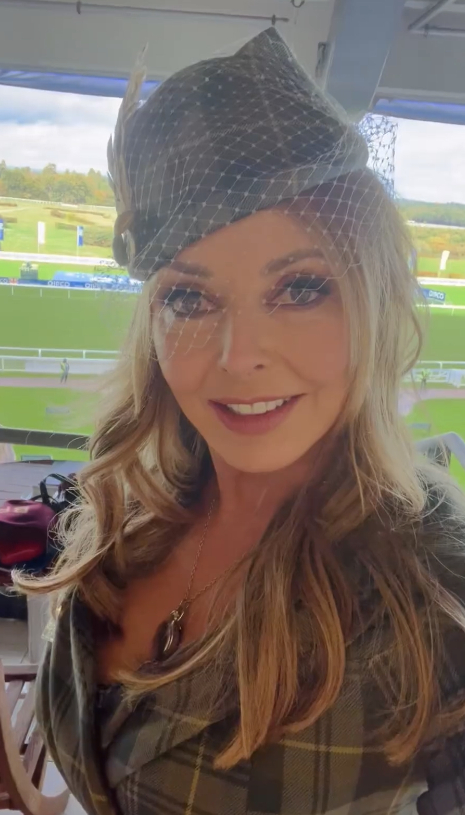 Carol Vorderman reveals incredible figure in low cut tartan dress at Ascot