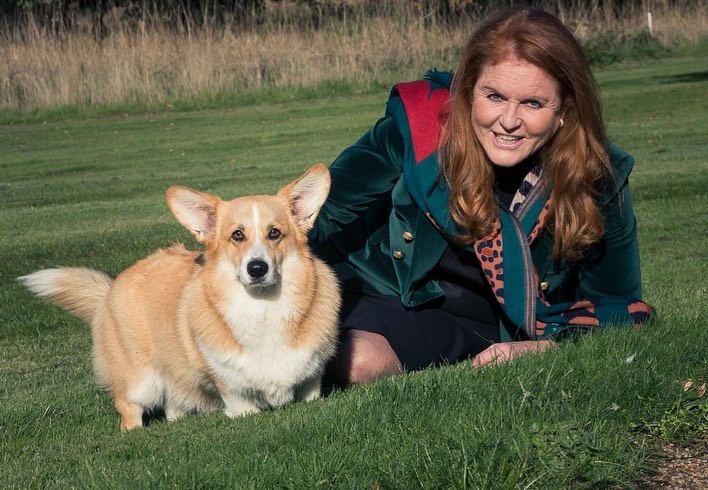 Sarah Ferguson poses with Queen’s corgis for first time since they moved in with Duchess and Prince Andrew