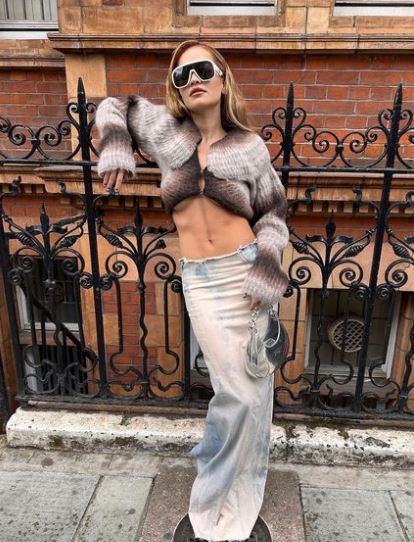 Rita Ora looks slimmer than ever as she shows off washboard abs in London