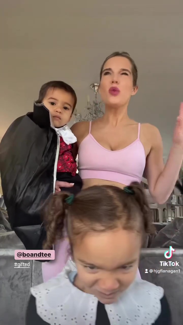 Newly-single Helen Flanagan shows off her abs in a crop top and leggings in sweet Halloween video with her kids