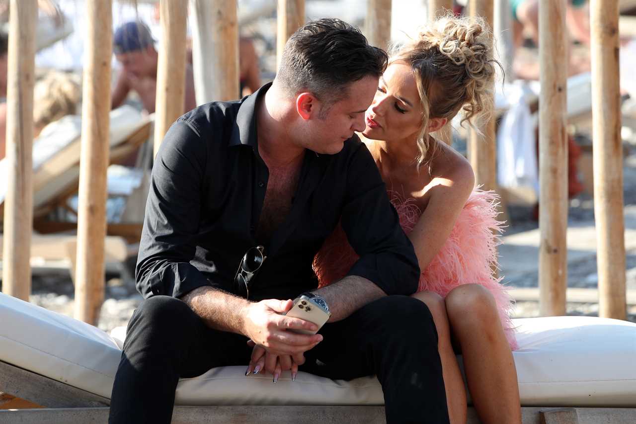 Laura Anderson and Gary Lucy look loved up as they film Celebs Go Dating finale on the beach