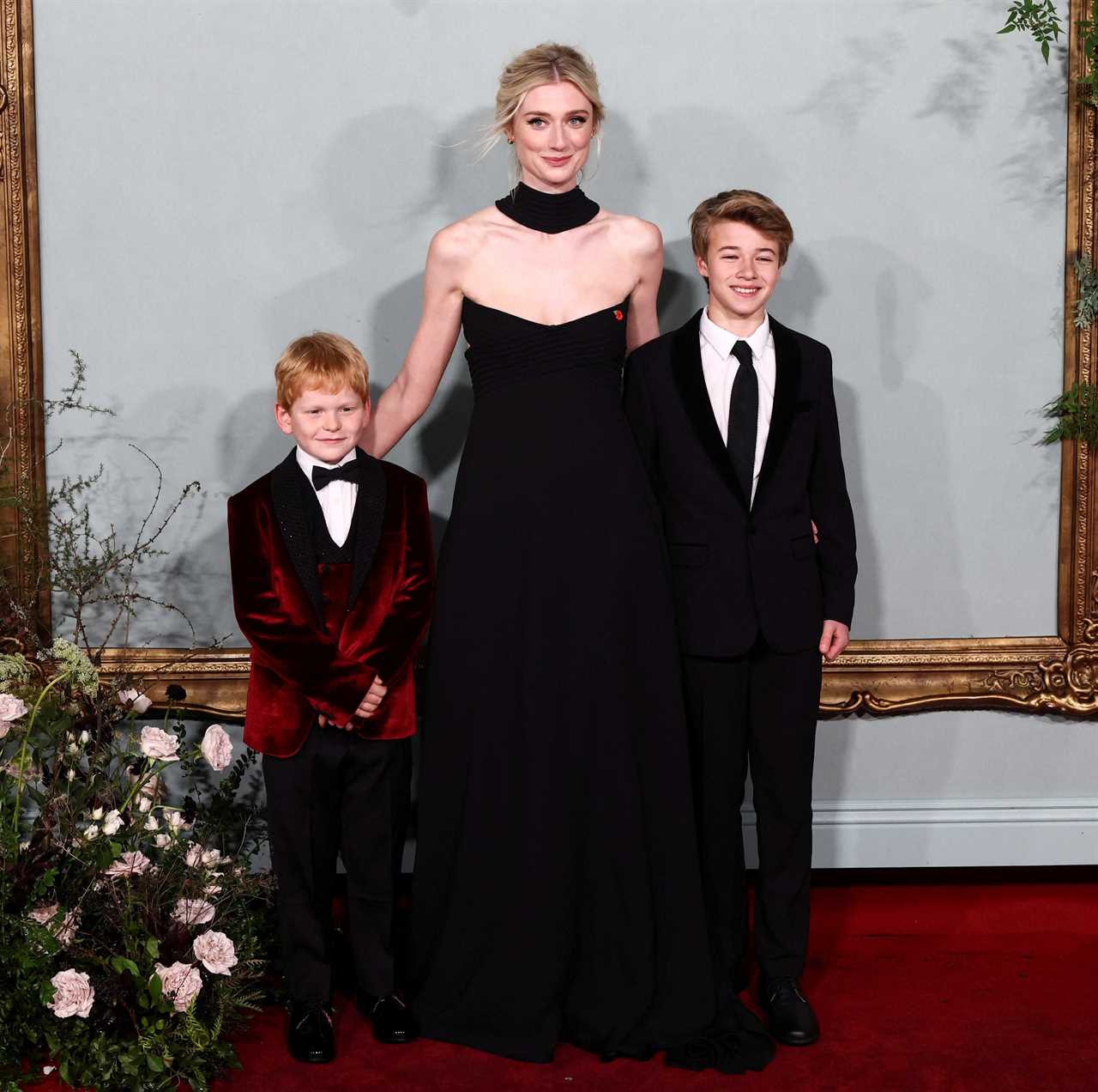 Elizabeth Debicki wows in black gown harping back to Diana’s iconic ‘revenge dress’ for The Crown premiere