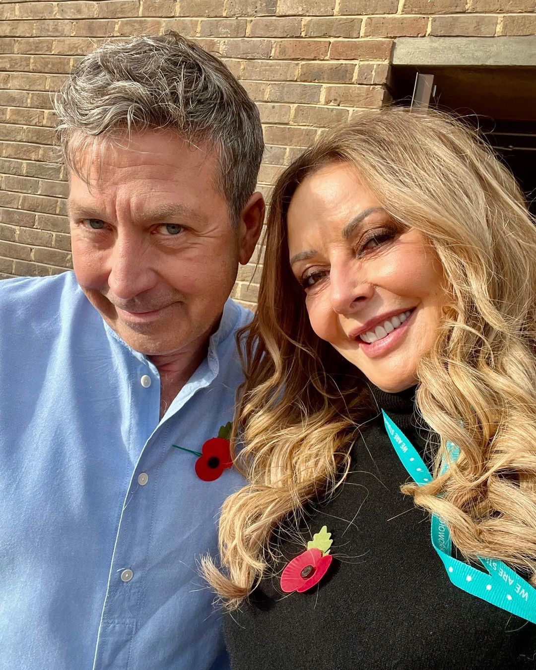 Carol Vorderman looks incredible as she shows off curves in tight green jumper