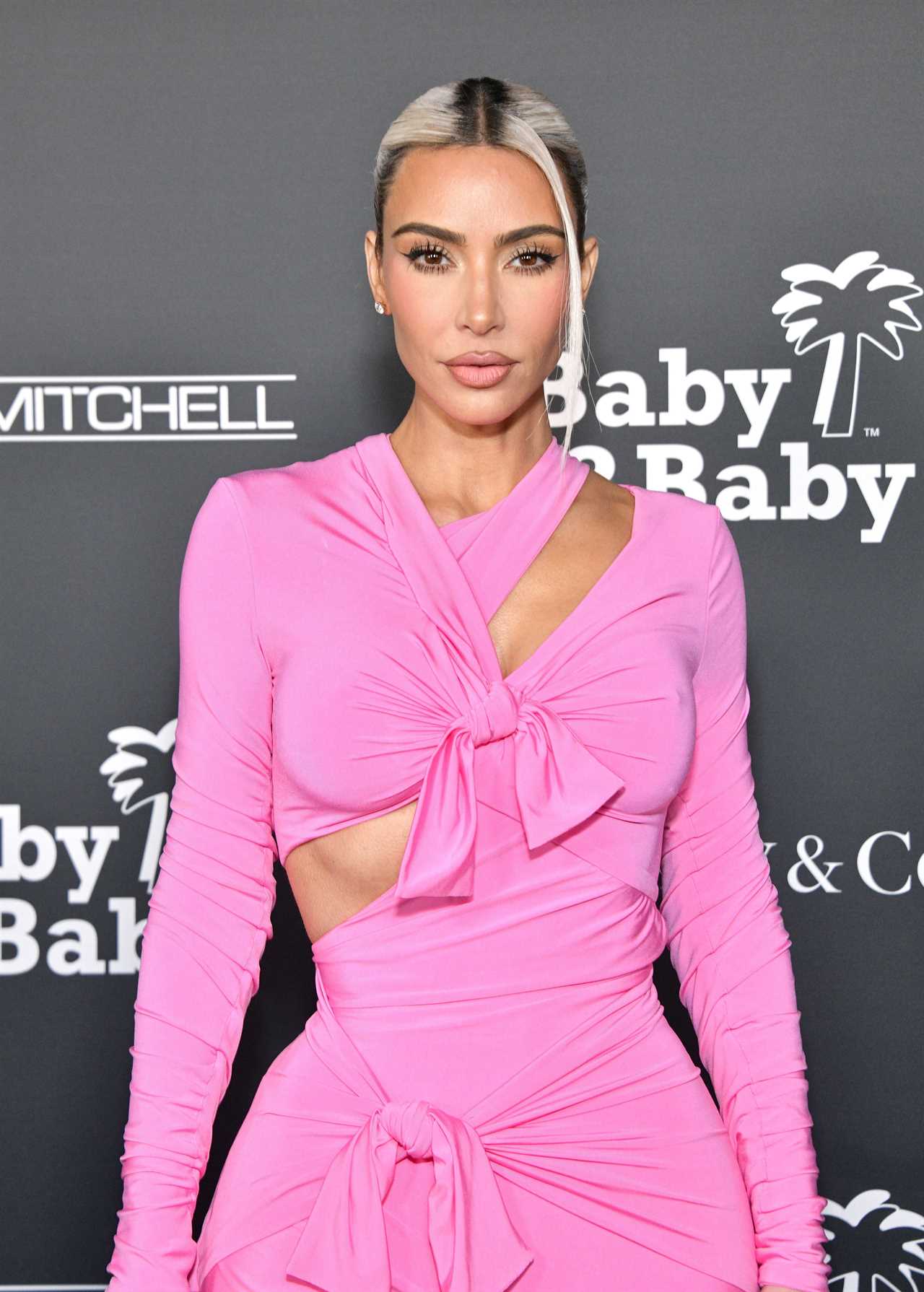 Kim Kardashian flaunts her thin figure in tight pink dress at gala after star sparks concern over major weight loss