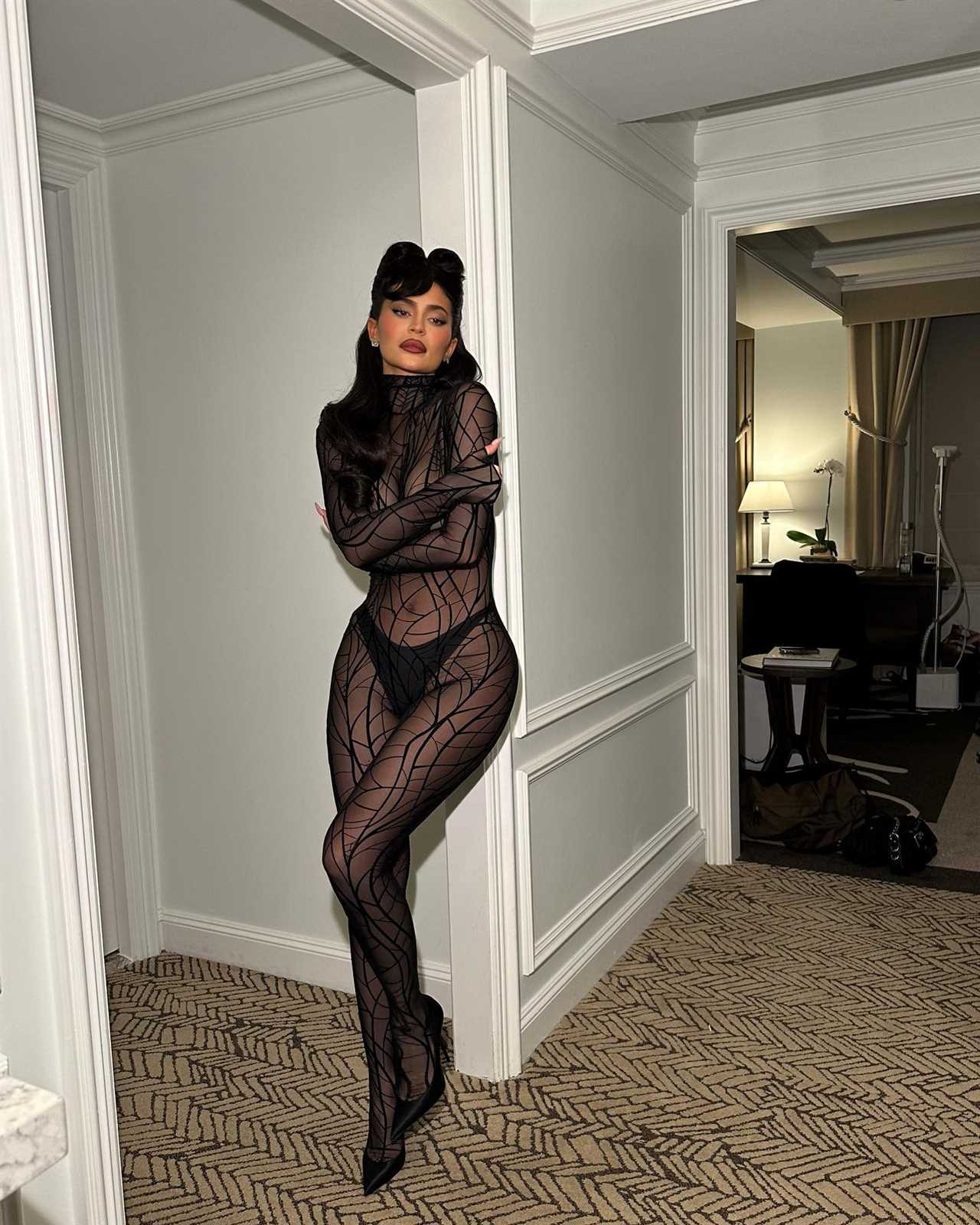 Kylie Jenner shocks fans as she strips totally naked in see-through bodysuit for raunchiest outfit yet