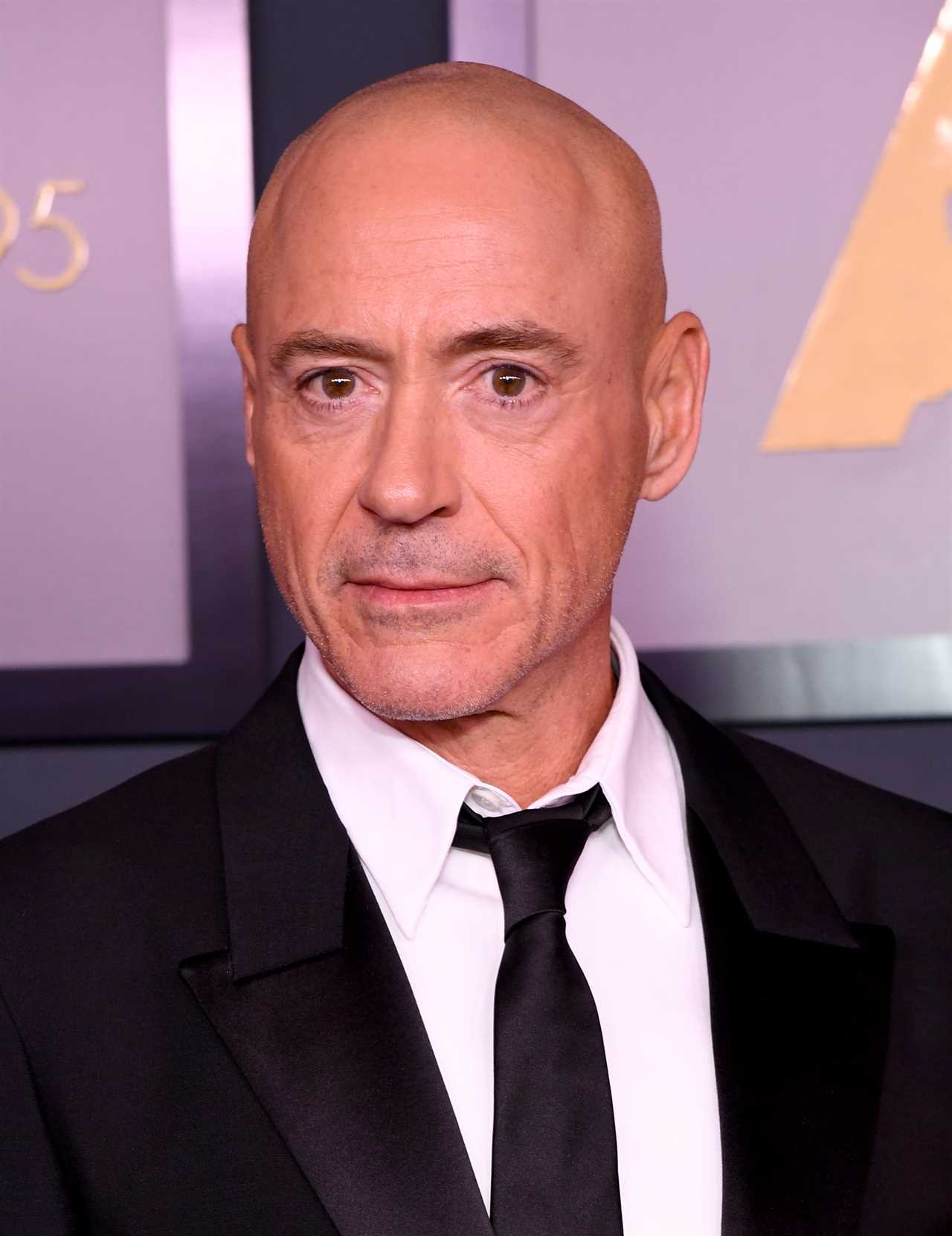 Robert Downey Jr. shocks fans as actor looks unrecognizable with bald head at awards show with wife Susan