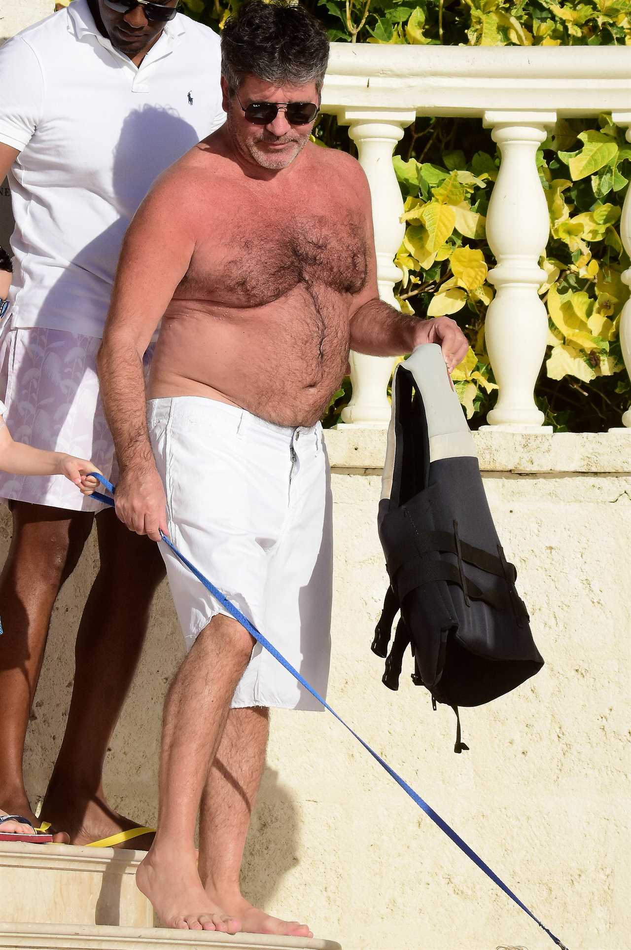 Simon Cowell looks slimmer than ever as he shows off three-stone weight loss