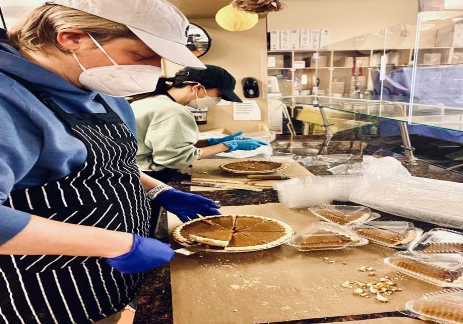 Masked Meghan Markle, 41, spotted preparing pumpkin pie lunch at homeless shelter