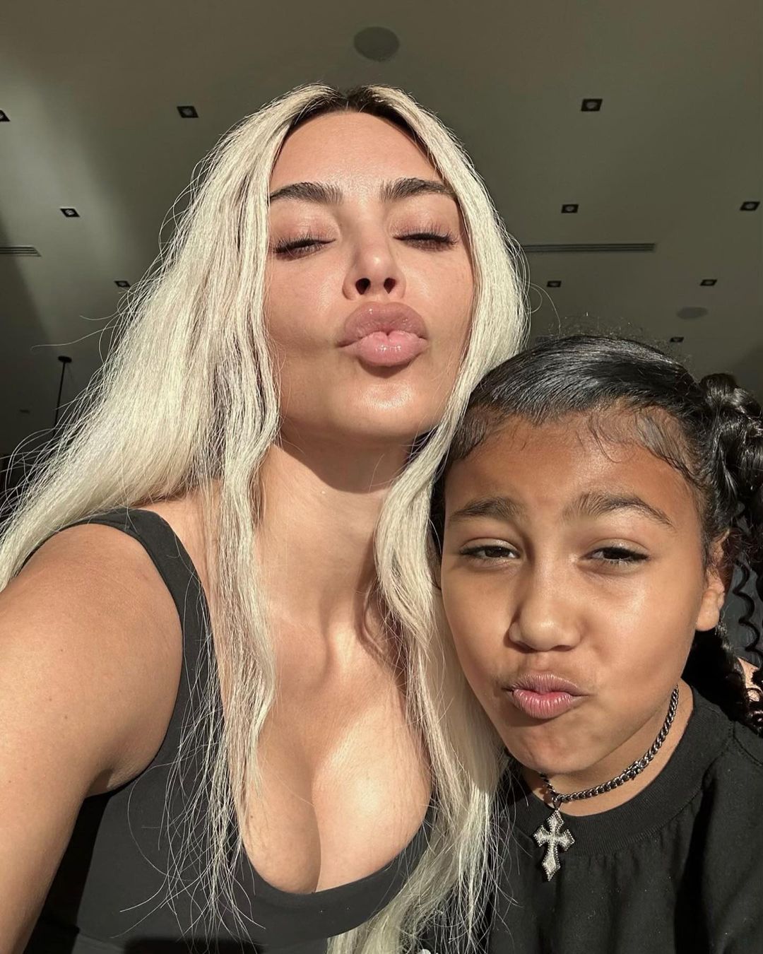 Kim Kardashian reveals completely natural skin including wrinkles and blemishes in new selfie with daughter North, 9