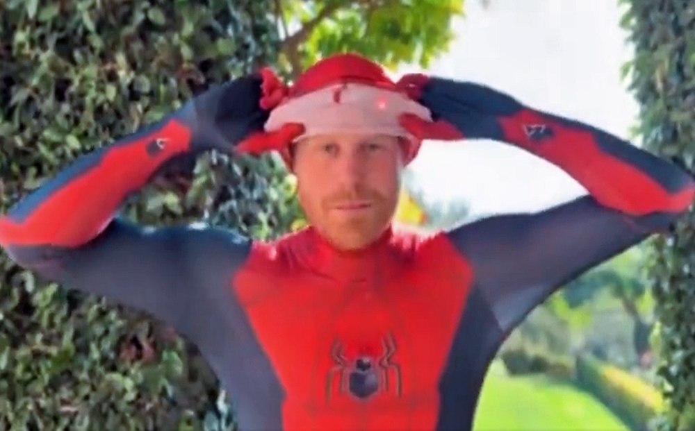 Prince Harry dresses up as Spider Man as he sends Christmas video message to children who have lost their parents