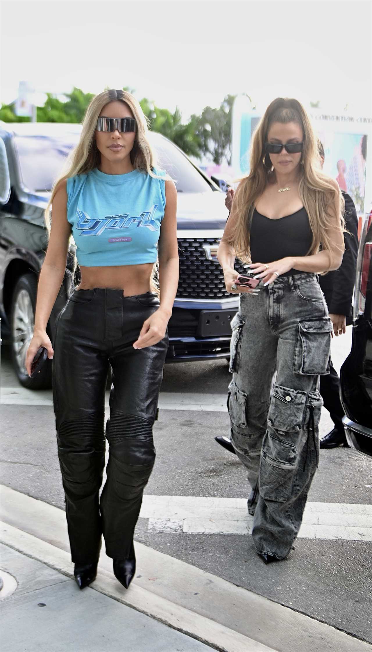 Kim Kardashian reveals real skin texture including stomach wrinkles in rare unedited new pics as she wears tiny crop top