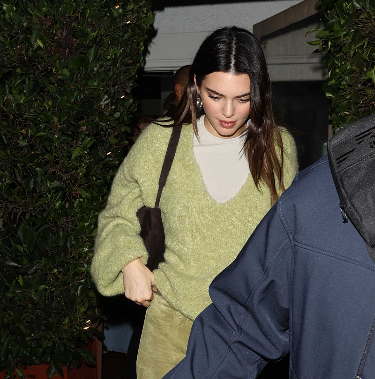 Kardashian fans mock Kendall Jenner’s all green outfit & claim she ‘looks like the grinch’ in new photos of star in LA