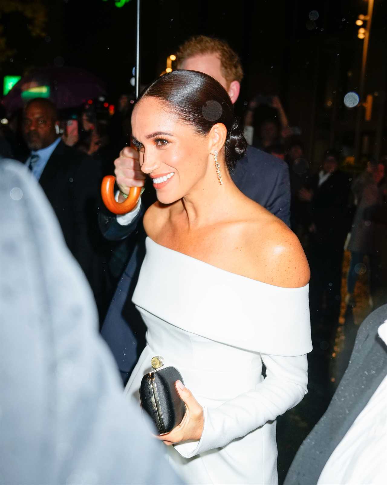 Meghan Markle wears strapless white dress to accept ‘anti-racism’ award with suited Prince Harry ahead of Netflix doc