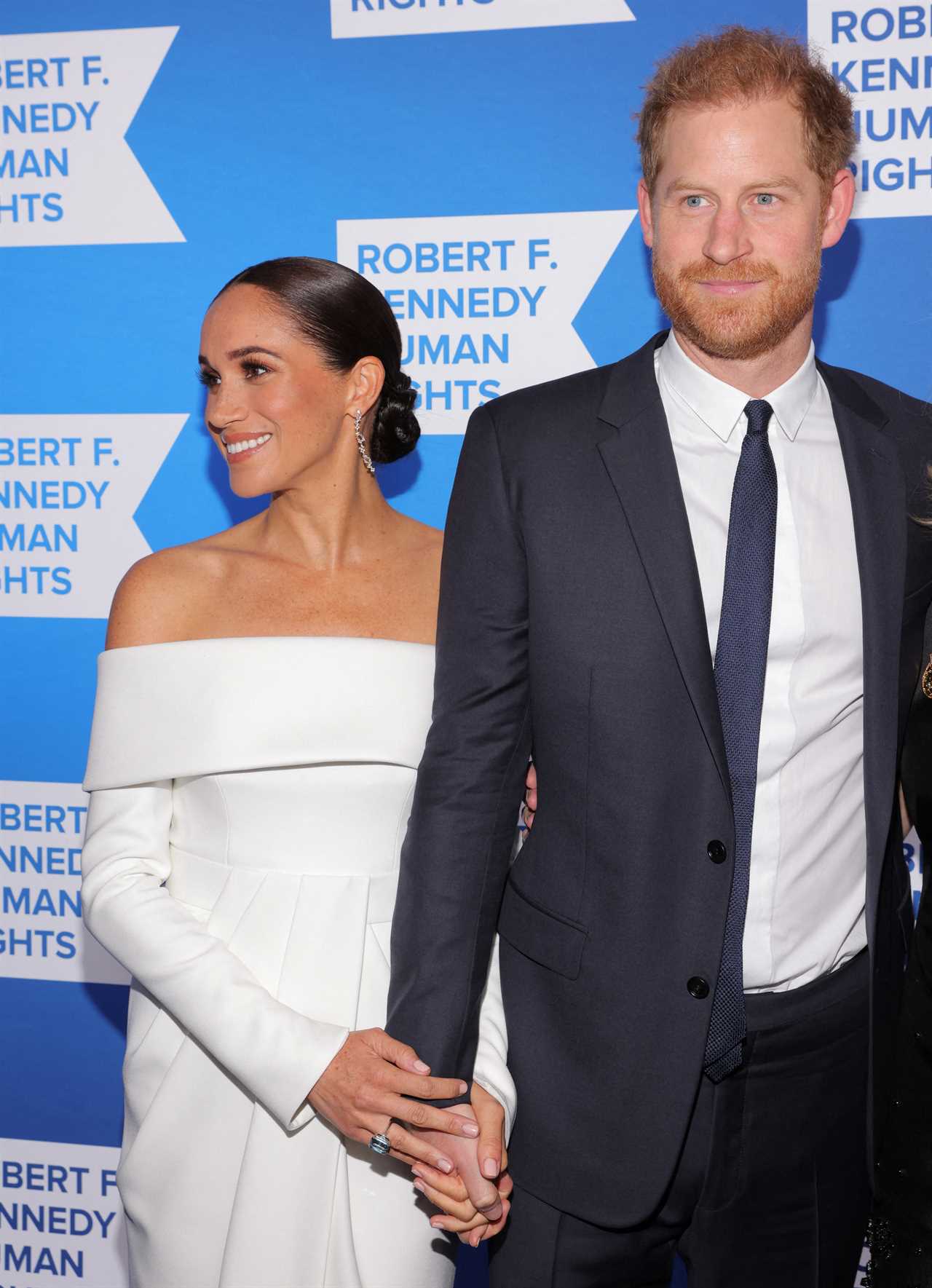 Meghan Markle wears strapless white dress to accept ‘anti-racism’ award with suited Prince Harry ahead of Netflix doc